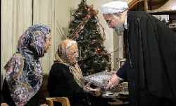 ​Ruhani İran-Irak Savaşında şehit düşen İran`lı Ermeniler`in ailelerini ziyaret etti