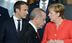 ​Merkel`den Erdoğan`a tepki: Macron hakkındaki açıklamaları karalayıcı ve kabul edilemez